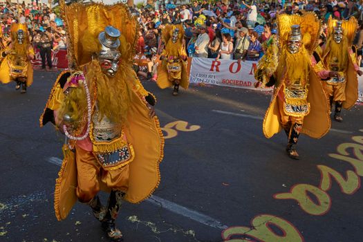 Arica, Chile - January 23, 2016: Morenada dance group performing a traditional ritual dance as part of the Carnaval Andino con la Fuerza del Sol in Arica, Chile.