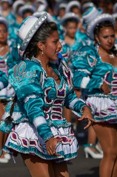 ARICA, CHILE - JANUARY 22, 2016: Caporales dance group performing at the annual Carnaval Andino con la Fuerza del Sol in Arica, Chile.