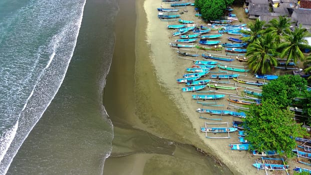 Aerial view of boats moored off Rajegwesi Beach. Banyuwangi. Indonesia. Photo taken with drone.
