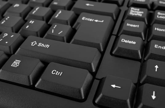 Part of a computer keyboard, black, close-up