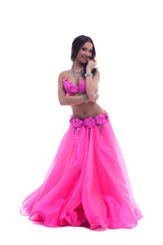 Full length portrait of beautiful dancer in pink costume. Isolated on white