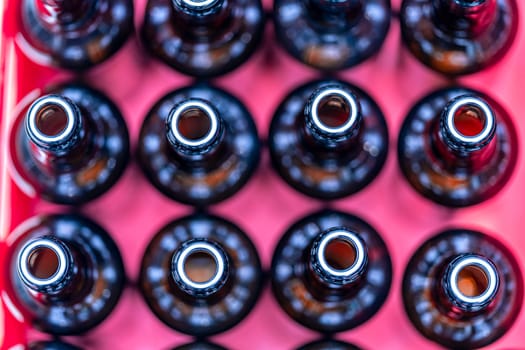 empty glass drink bottles in stock. High quality photo