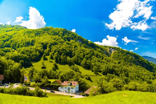 Houses and mountains near Lake Lungern, Lungerersee, Obwalden Switzerland.