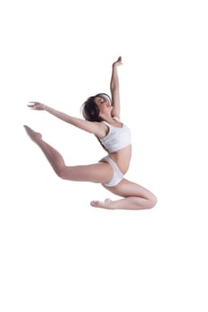 young woman in white lingerie jumping. Isolated on white