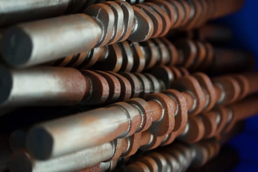 Pile of rusty worn drill, close-up