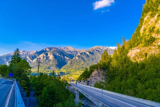 Road and mountains on sunset Sankt Moritz, Maloja Grisons Switzerland.