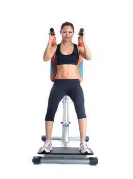 Brunette woman on isodynamic exerciser. Isolated on white