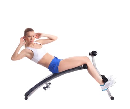 Athletic woman exercising muscles on bench, isolated on white