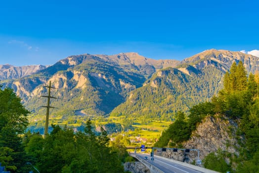 Road and mountains on sunset Sankt Moritz, Maloja Grisons Switzerland.