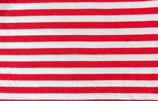 Fabric sample in red white horizontal stripe with worked. Background, texture