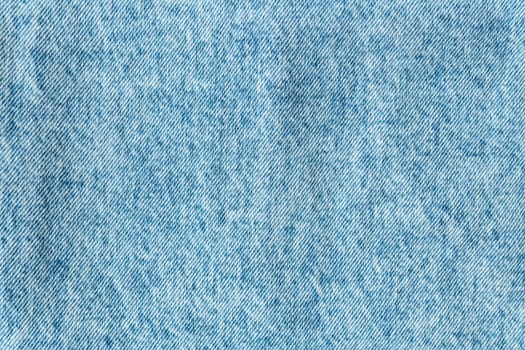 Denim structure, classic blue denim fabric, clear fabric structure, place for text. Background, texture. Selective focus, noise