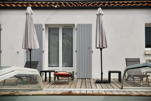The sun loungers by the pool in the garden