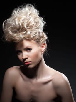 Studio portrait of pretty blonde woman