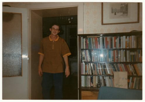 THE CZECHOSLOVAK REPUBLIC - CIRCA 1990s: Retro photo shows man at the home party.
