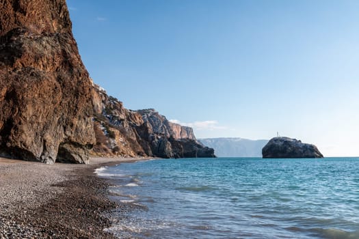 Aerial panoramic view of beautiful sunset above sea. Beautiful seascape. Sun glare, small waves on the water surface. Evening. Horizon. Nobody. No people. Copy space. Never-ending beauty of nature