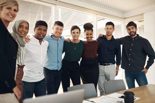 Were a team you can count on. Cropped portrait of a group of business colleagues standing in their office boardroom