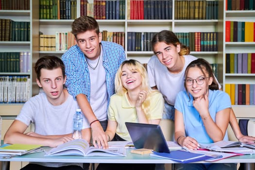 Group of teenage students study in library class. High school, education, adolescent, back to school, back to college concept