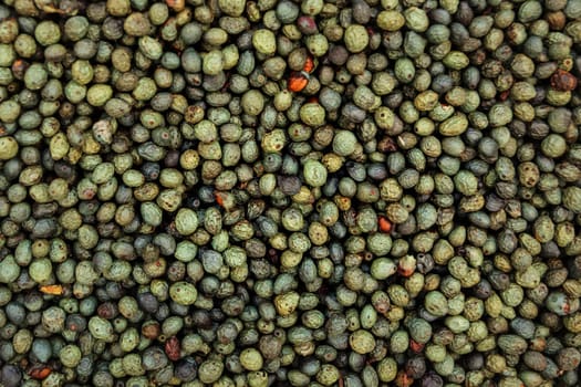 Turkish green, blue and black tellicherry pepper displayed on food market. Kyrenia, Cyprus