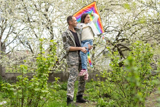 Soldier reunited with his daughter on a sunny day