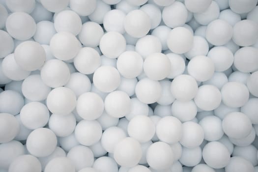 Many white plastic balls for dry pool in amusement park