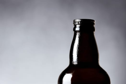 brown glass bottle used for either soda or beer