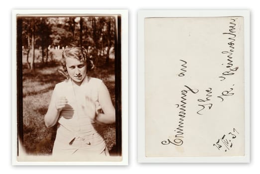 THE CZECHOSLOVAK REPUBLIC, APRIL 15: Front and back of vintage photo of a young girl in nature, April 15, 1931.