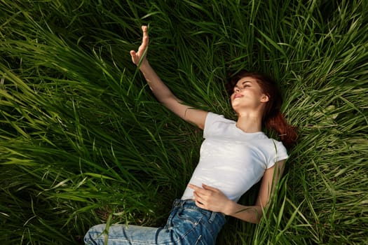 woman resting in the grass. High quality photo