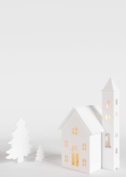 Beautiful white Christmas background. Xmas backdrop, mockup. Modern design. Empty space for text, advertising. Copy space. Vertical template for greeting, invitation card. House, fir trees. 3d render