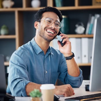 Business man, phone call and laughing at computer, office desk or conversation with smile. Happy worker, cellphone and communication for management, mobile networking or smartphone contact technology.
