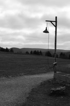 Vertical shot of an old lantern with wooden stake on the Steinberg near Goslar in the Harz Mountains, Germany