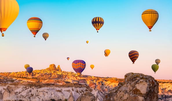 Bright hot air balloons in sky of Cappadocia, Turkey