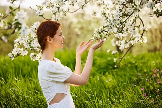 spring , summer beauty portrait of red head woman in light dress. High quality photo