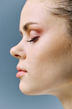 close macrophotography of a woman's face with problematic skin, on the topic of care. Vertical photo without retouching. High quality photo