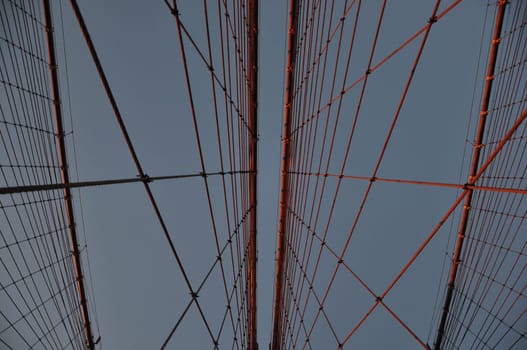 Low angle shot of rope scaffold of the Brooklyn bridge in New York