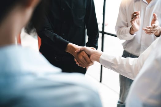 Business partnership meeting concept. Image businesspeople handshake. Successful businesspeople handshaking after good deal. Group support concept.