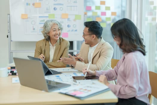 Asian entrepreneurs and business people meeting in a conference room in business planning, financial budget and investment risk assessment to analyze customer groups to increase company growth.