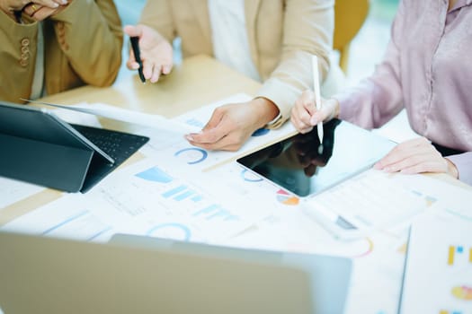 Asian entrepreneurs and business people meeting in a conference room in business planning, financial budget and investment risk assessment to analyze customer groups to increase company growth.