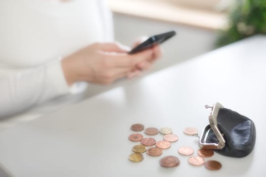 Bank, coins and mobile in tax files for financial year or consulting at work desk or at home. Economy, money and accountant working on corporate documents and administration for management. financial