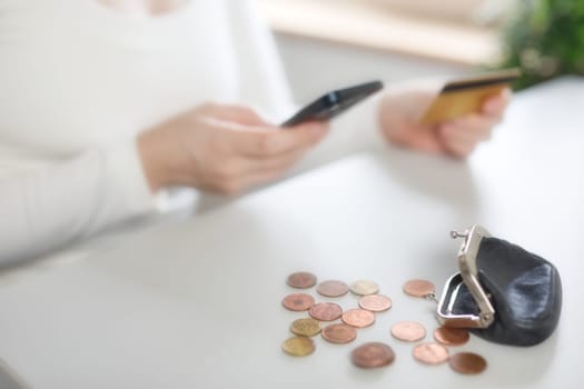 Bank, coins and mobile in tax files for financial year or consulting at work desk or at home. Economy, money and accountant working on corporate documents and administration for management. financial
