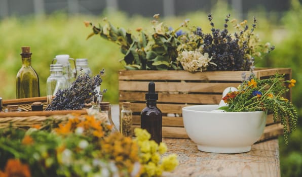 Medicinal herbs and natural tinctures. Selective focus. Nature.