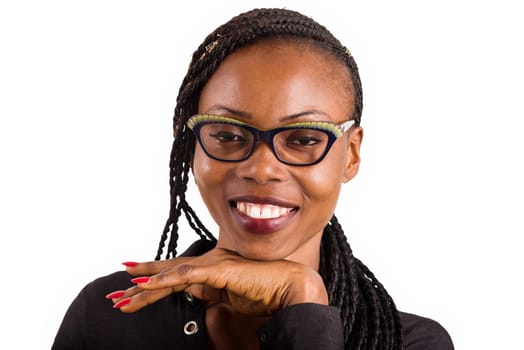 young african woman in glasses isolated on white background looking at camera smiling.
