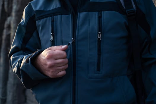Man tourist standing in military outfit outdoor. Travel or military concept