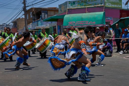 Arica, Chile - January 23, 2016: Tobas dancers in traditional Andean costume performing at the annual Carnaval Andino con la Fuerza del Sol in Arica, Chile.