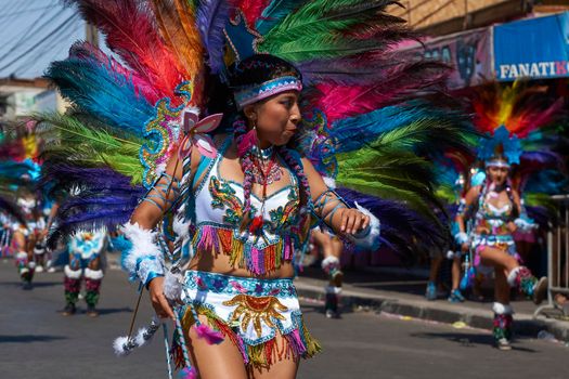 Arica, Chile - January 23, 2016: Tobas dancers in traditional Andean costume performing at the annual Carnaval Andino con la Fuerza del Sol in Arica, Chile.