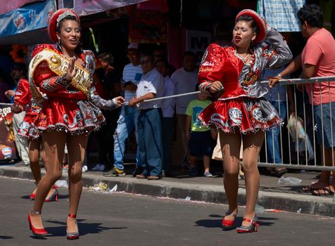 ARICA, CHILE - JANUARY 22, 2016: Caporales dance group performing at the annual Carnaval Andino con la Fuerza del Sol in Arica, Chile.