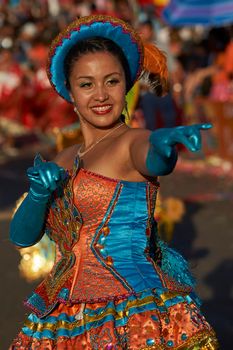 Arica, Chile - January 23, 2016: Morenada dance group performing a traditional ritual dance as part of the Carnaval Andino con la Fuerza del Sol in Arica, Chile.