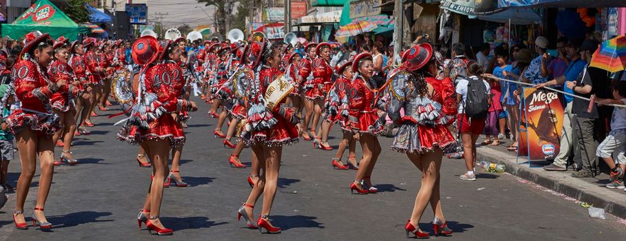 ARICA, CHILE - JANUARY 22, 2016: Caporales dance group performing at the annual Carnaval Andino con la Fuerza del Sol in Arica, Chile.