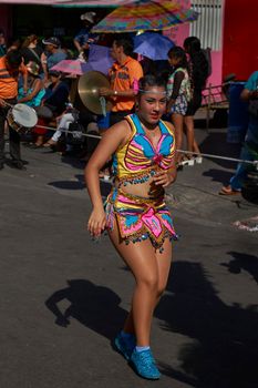 Arica, Chile - January 23, 2016: Tobas dancers in traditional Andean costume performing at the annual Carnaval Andino con la Fuerza del Sol in Arica, Chile.