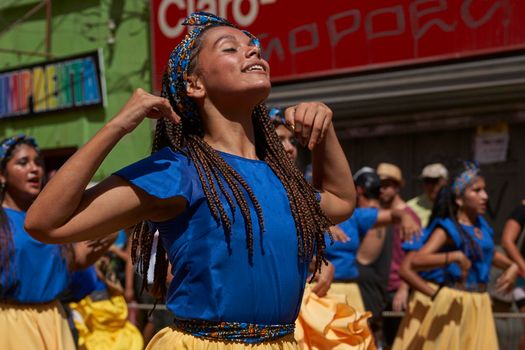 ARICA, CHILE - JANUARY 23, 2016: Group of dancers of Africa descent (Afrodescendiente) performing at the annual Carnaval Andino con la Fuerza del Sol in Arica, Chile.