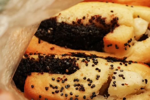 Buns with poppy seeds and cottage cheese close up, macro photo